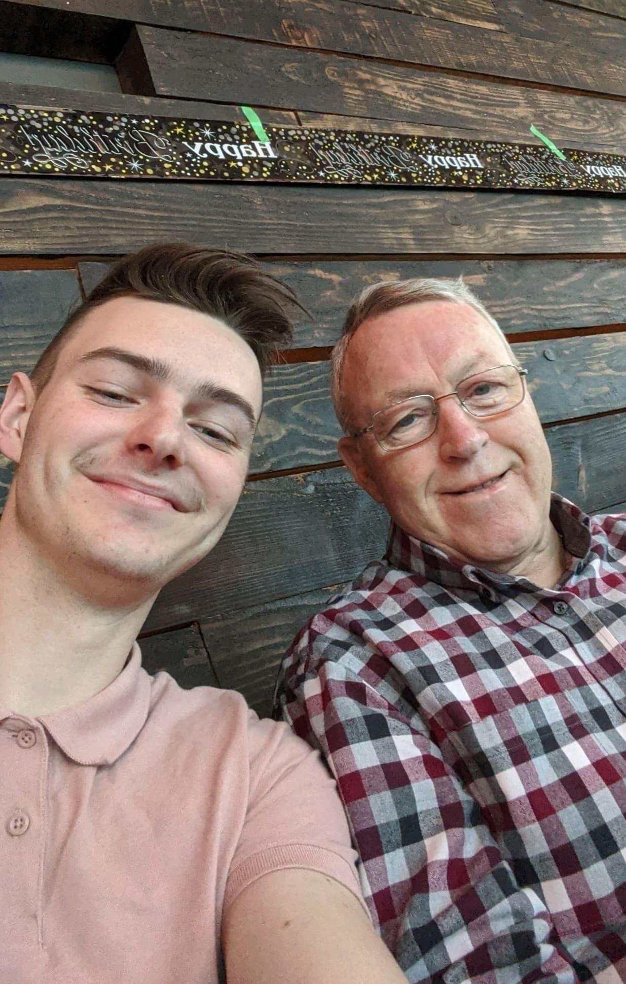 Ethan and his grandpa, side by side